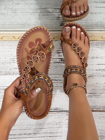 Flair - Sommerliche Bohemian-Zehenstegsandalen mit Blumenverzierung